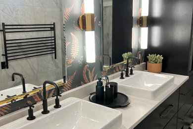 Bathroom - mid-sized transitional master gray tile and porcelain tile porcelain tile, multicolored floor and double-sink bathroom idea in Austin with flat-panel cabinets, dark wood cabinets, a two-piece toilet, gray walls, a console sink, quartz countertops, white countertops and a floating vanity