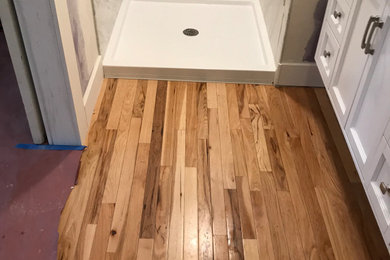 Mid-sized french country master white tile and ceramic tile single-sink bathroom photo in Denver with raised-panel cabinets, white cabinets, granite countertops, white countertops and a built-in vanity