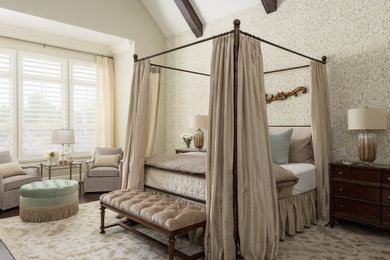 Inspiration for a timeless exposed beam bedroom remodel in Houston