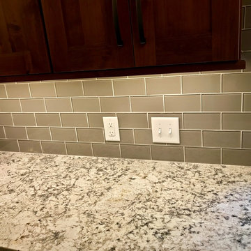 Dura Supreme Cabinets Knotty Alder Butternut Romanix Granite Galley Kitchen