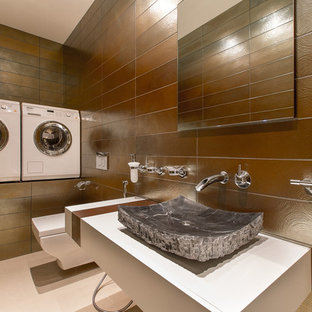 Design ideas for a contemporary separated utility room in Other with a single-bowl sink, white cabinets, brown walls and a side by side washer and dryer.