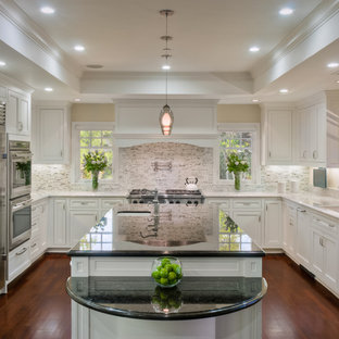 75 Beautiful U Shaped Kitchen With Stone Tile Backsplash