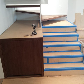 Custom walnut stairs & wet bar Soho- New York, NY