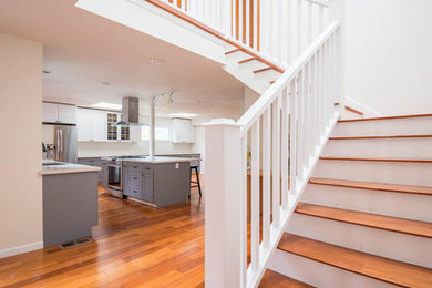 Inspiration for a mid-sized 1960s wooden l-shaped staircase remodel in San Francisco with wooden risers