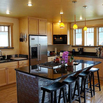 Kitchen Island Embellished with Tin Tiles