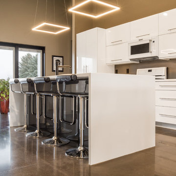 Modern Geometric Kitchen w/ Stunning Island Countertop and Waterfall Edges