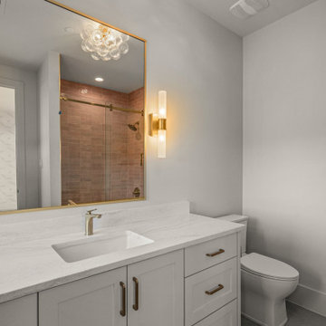 Argyle Little Girl's Bath: Pink Zellige Tile & Gold Fixtures and Camria Countert