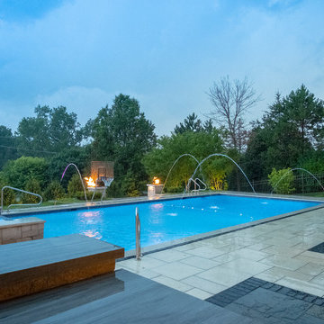 Burr Ridge Lap Pool with Raised Hot Tub and Waterfall