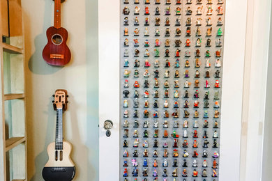 Kids' room - small craftsman gender-neutral kids' room idea in Santa Barbara with green walls
