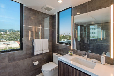 Bathroom - large modern master bathroom idea in Los Angeles with a built-in vanity