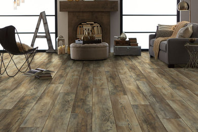Mid-sized minimalist formal and enclosed vinyl floor and brown floor living room photo in Other with brown walls