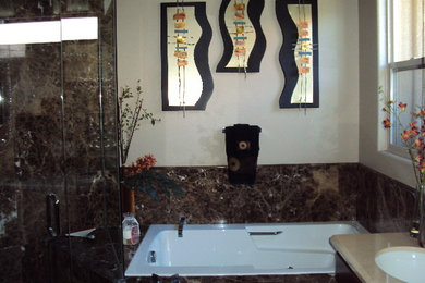 Example of a transitional bathroom design in Other