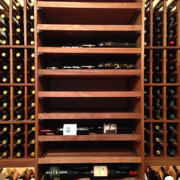 Tall wine storage consisting of drawers for large format bottles.