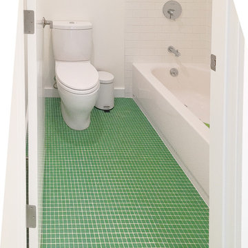 Green Floor Mosaic by Ann Sacks and White Subway Tile Shower