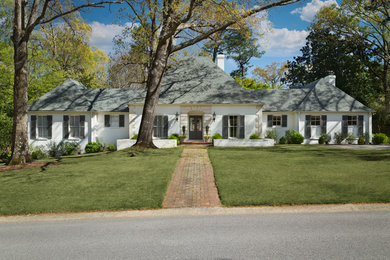 Example of a large transitional white gable roof design in Birmingham