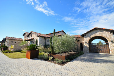 Tuscan exterior home photo in Austin