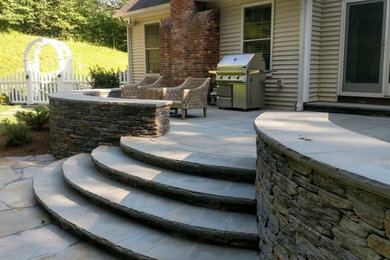 Mid-sized elegant backyard patio photo