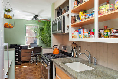 Small eclectic galley porcelain tile and beige floor kitchen photo in Salt Lake City with an undermount sink, open cabinets, orange cabinets, quartzite countertops, beige backsplash, porcelain backsplash and stainless steel appliances