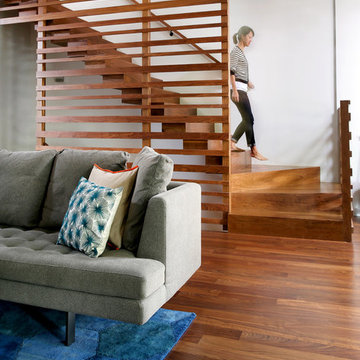 Custom walnut stairs and slide hybrid