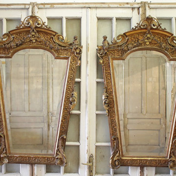 Rare French 19th Century Pair of Giltwood Cherub Mirrors