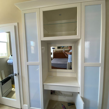 White glass to hide the interiors with hidden magnetic lock, push to open doors