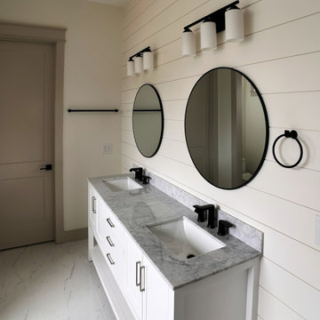 Bright, Modern Master Bathroom with Freestanding Tub & Custom Vanity