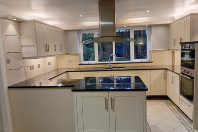 Example of a minimalist kitchen design in Other