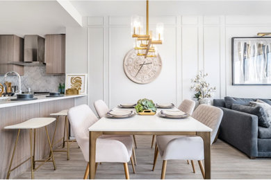 Kitchen/dining room combo - small eclectic laminate floor and gray floor kitchen/dining room combo idea in Vancouver with gray walls