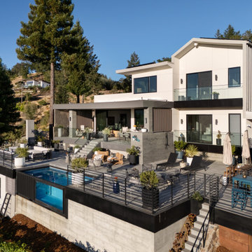 A little farm below a hillside resort-style off-the-grid view home