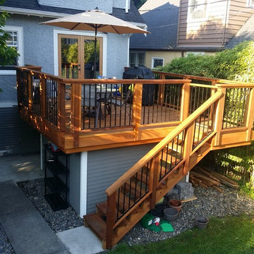 Cedar wood deck with metal railings