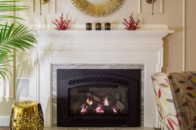 Living room - mid-sized transitional formal and enclosed medium tone wood floor and brown floor living room idea in Boston with beige walls, a standard fireplace, a stone fireplace and no tv