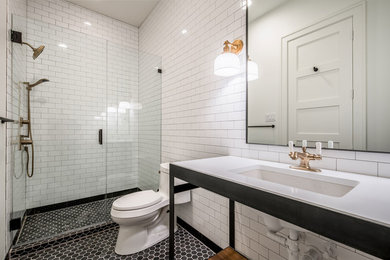 Doorless shower - mid-sized rustic master white tile and ceramic tile ceramic tile and black floor doorless shower idea in Dallas with open cabinets, black cabinets, a one-piece toilet, white walls, an undermount sink, quartzite countertops, a hinged shower door and white countertops