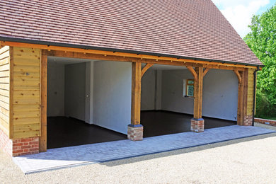 Photo of a large modern detached carport in Other with three or more cars.