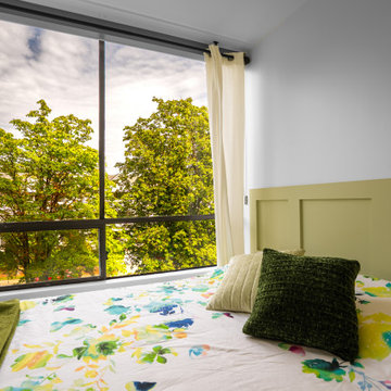 Hollyburn Condo Renovation – Guest Bedroom with Custom Wall Paneling
