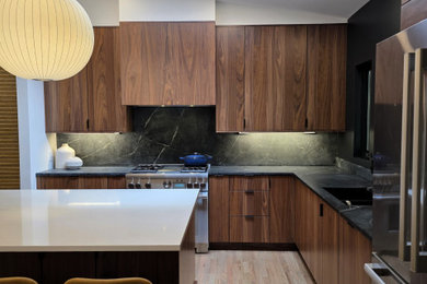 Example of a mid-century modern kitchen design in Atlanta