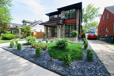 Example of a minimalist exterior home design in Detroit