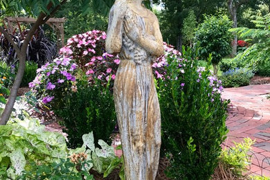 Design ideas for a large rustic partial sun courtyard brick landscaping in New Orleans for summer.