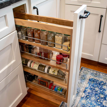 Kitchen with White Perimeter and Blue Island Cabinet Reface