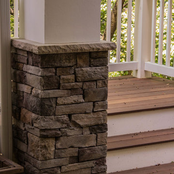 . Cultured Stone column base with limestone cap and stucco above
