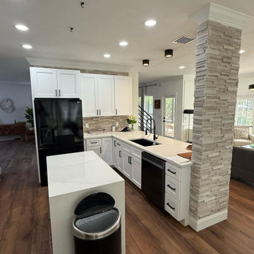 **Complete Kitchen, Flooring, Complete Stair Case and Trim