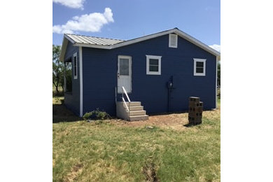 Inspiration for a cottage exterior home remodel in Austin
