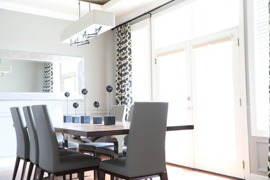 Example of a trendy dining room design in Denver