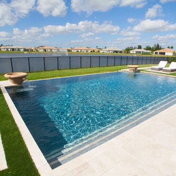 Big Pool with Infinity Edge and Custom Water Bowls in Davie, Florida