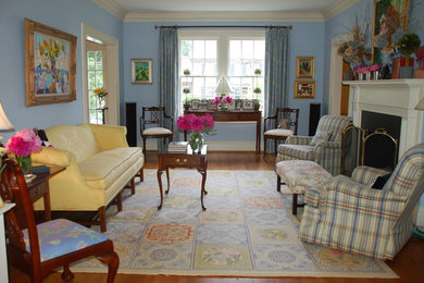 Living room - traditional living room idea in Other