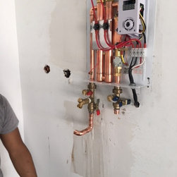 Tankless water Heater Install - Heating And Cooling