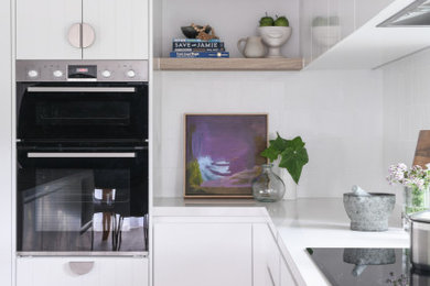 This is an example of a modern kitchen in Newcastle - Maitland.