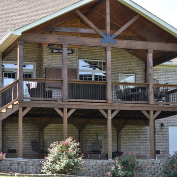 Custom open gable porch with tongue and groove ceiling and cedar posts