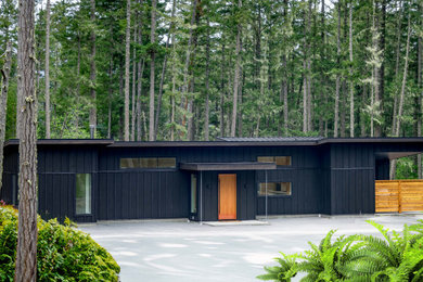 Example of a minimalist exterior home design in Vancouver