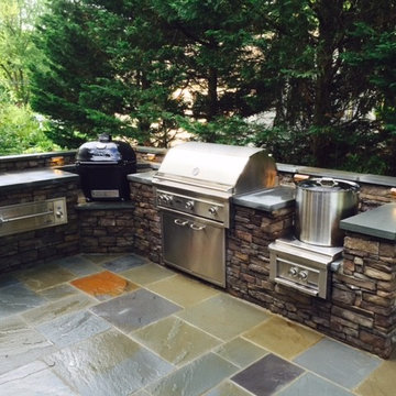 Outdoor Kitchen with built-in Big Green Egg & Grill on a flagstone Patio VA