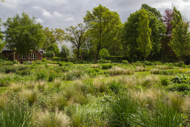 This is an example of a farmhouse landscaping in Amsterdam.